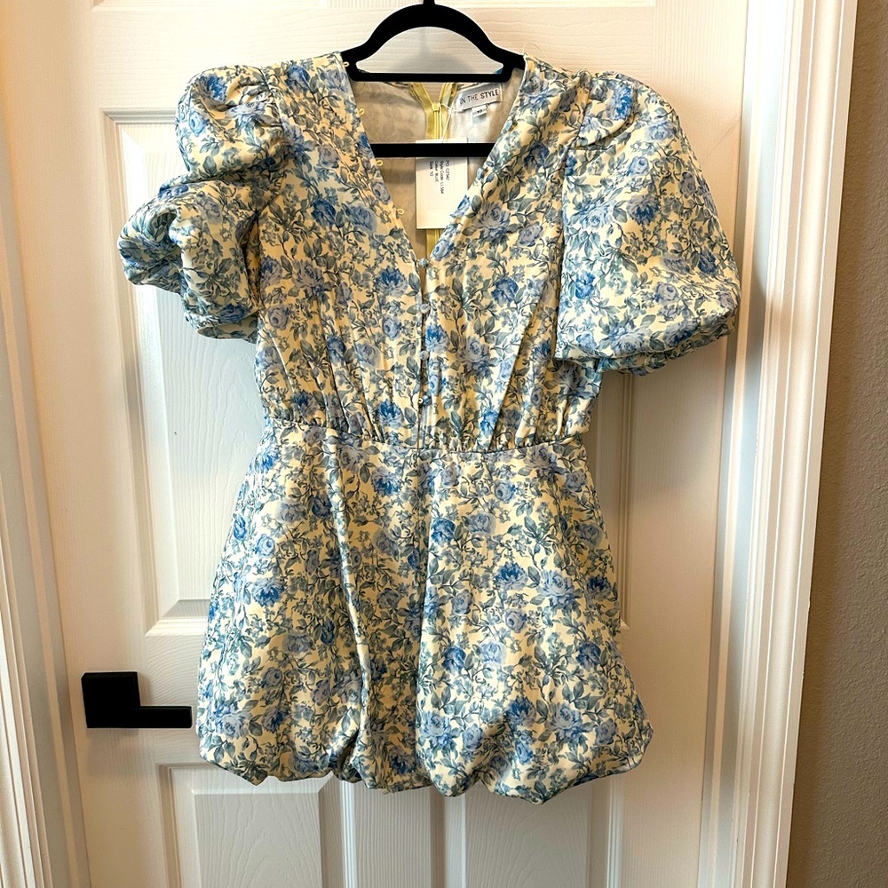 NEVER WORN! Bubble sleeve and shorts romper.
